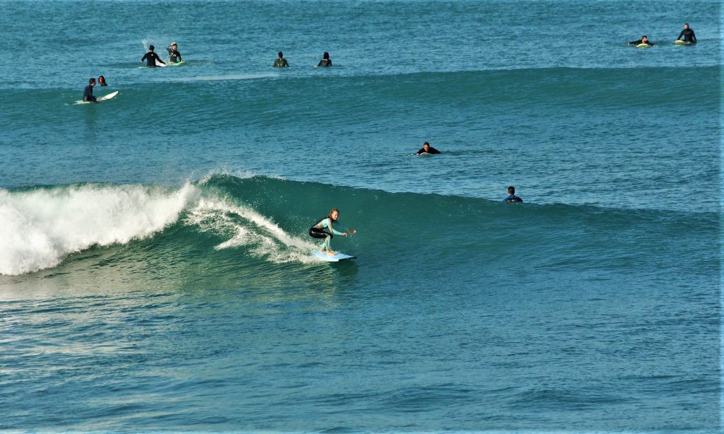 Surfing green wave Morocco